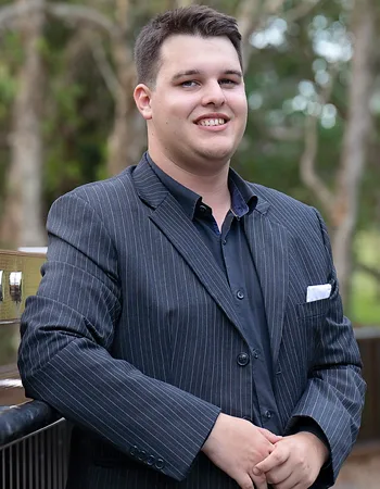 Portrait of Tyson Healy, Property Management Specialist